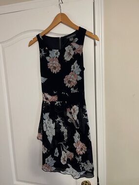 Suzy Shier Black Floral Sleeveless Mini Dress that ties back.